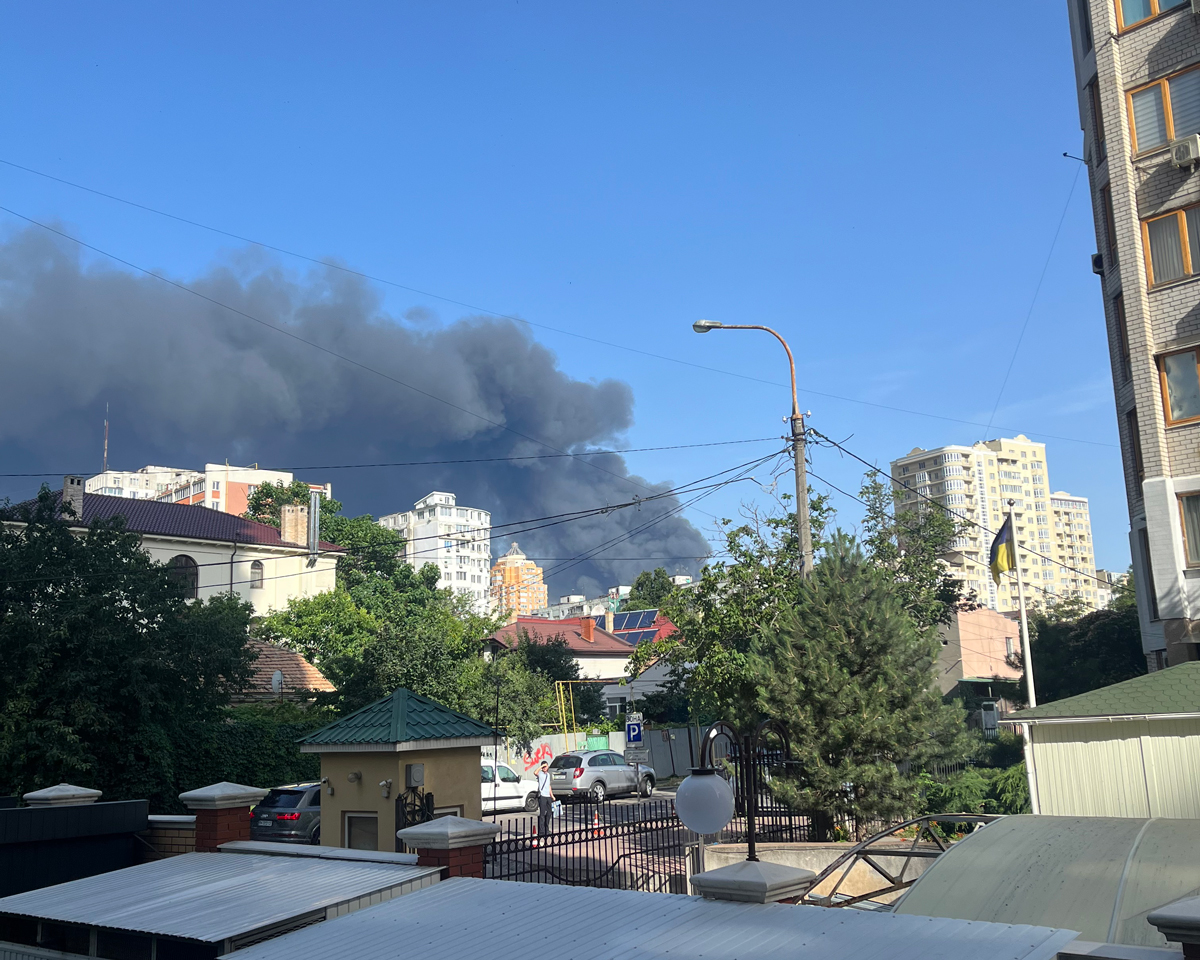 Plume of smoke from russian cruise missile attack on civilian infrastructure.